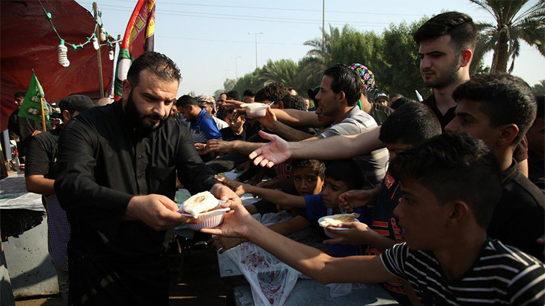 The Iraqi displaced families serve Arba'een pilgrims.