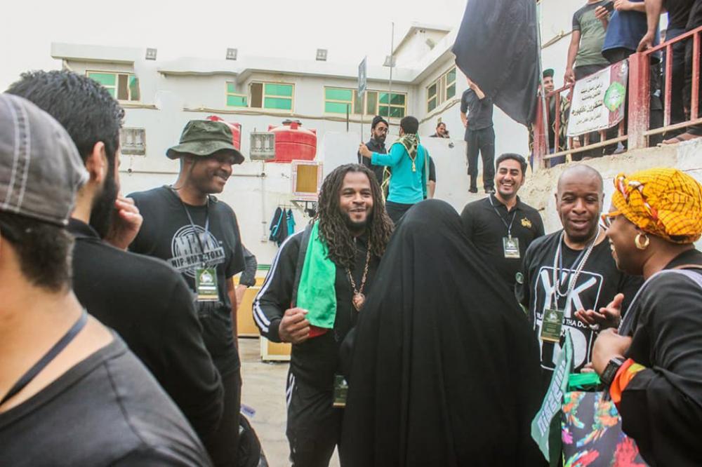 A procession from 25 nationalities arrives to the procession of the two holy shrines on the road of "Ya Hussayn".