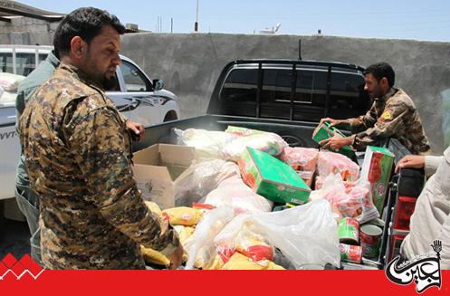 Imam Hussain(AS) Holy Shrine gives food baskets to the families of Iraqi martyres during Ramadan month.