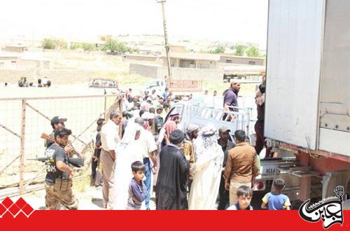 The Relief Committee of the Office of the Supreme Religious Authority Sayed Ali al-Sistani lands in Badush, Iraq.