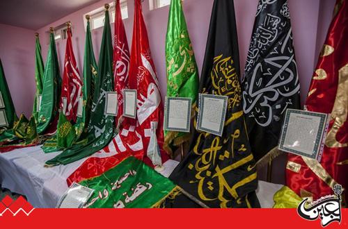 A delegation from the al-Abbas's(p) Holy Shrine attends the opening ceremony of "Flags' exhibition" held by Kufa University.