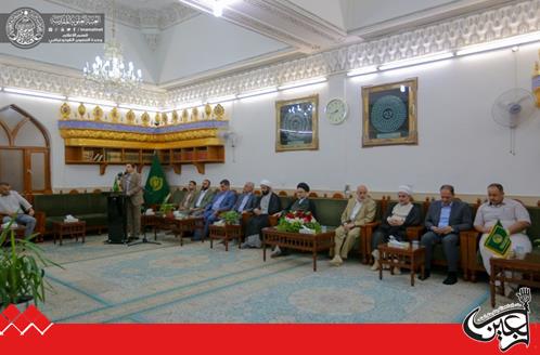 The Head of  Iraq's Shia Endowment Gives the Keys of the Holy Shrine of Imam Ali(PBUH) to the Authorized Committee.