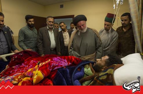 A delegation from the al-Abbas's(p) Holy Shrine visited the wounded of the security forces and the popular mobilization in al-Kafeel Hospital.