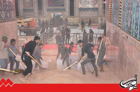 Covering main entrance to East gate of Imam Hussein(AS) Holy Shrine with sand to facilitate pilgrims' traffic.