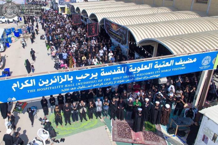 The Holy Shrine of Imam Ali (PBUH) Participates in the Longest Congregational Prayer on the way to Karbala.