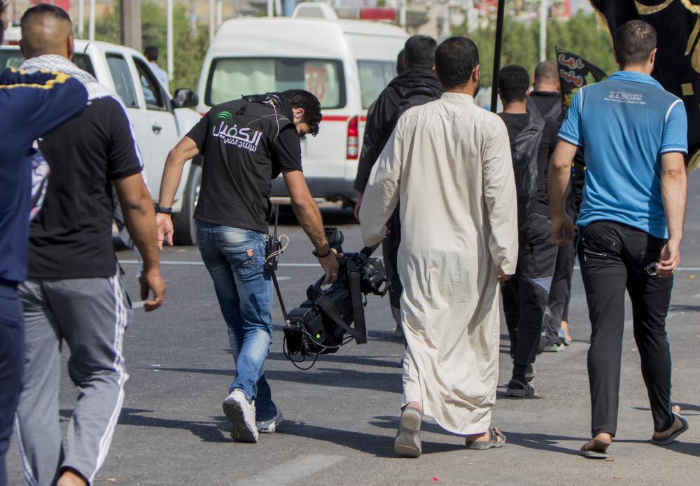 The camera of al-Kafeel keeps pace with the millions of visitors heading towards Karbala.